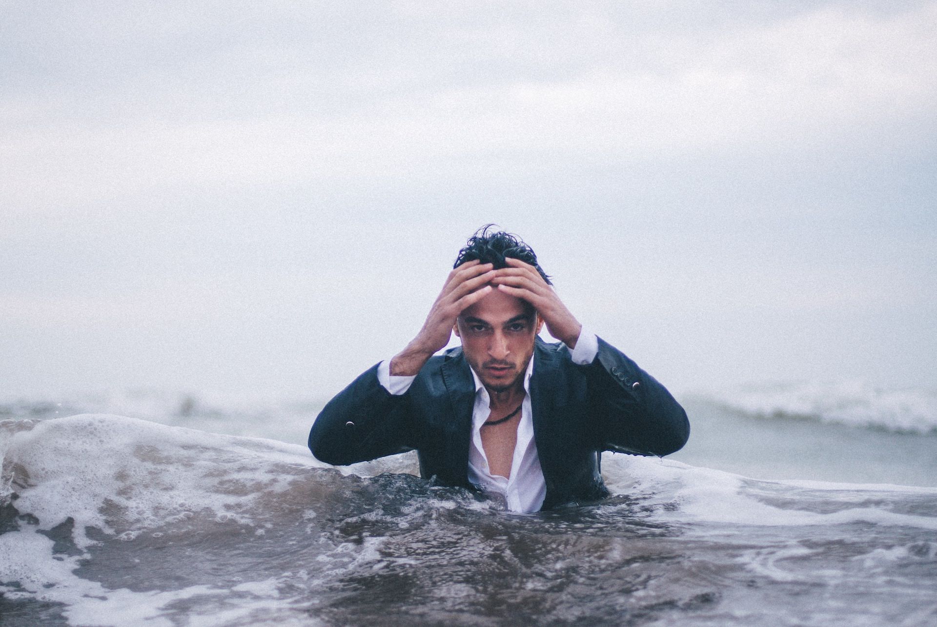 man in deep water image